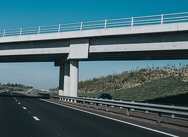 A central reservation barrier alongside a road, an example of a vehicle restraint system