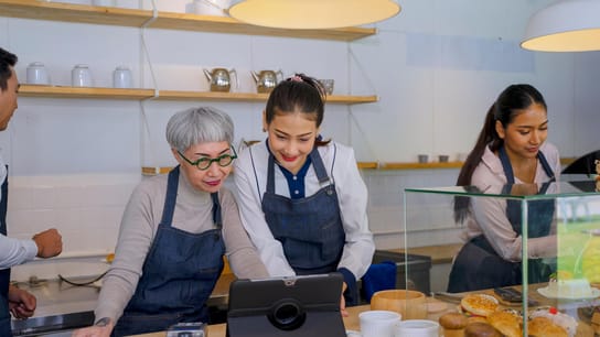 Entrepreneur and teamwork at bakery and coffee café. 