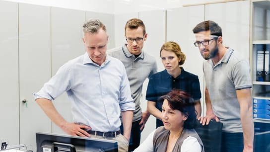 Group of Manager And Engineers Have Business Meeting In Factory Office