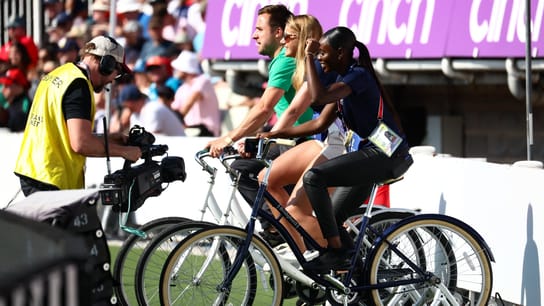 Multiple people on bikes.