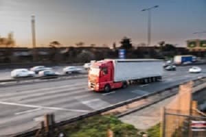 Truck driving across highway