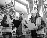 Health and Safety Workers glancing at clipboards