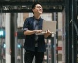 Man in warehouse with tablet Man in warehouse with tablet