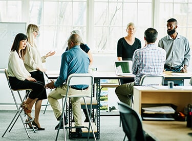 People discussing in a meeting room