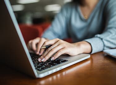 Woman using Laptop