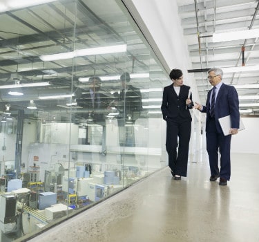 client manager walking talking factory