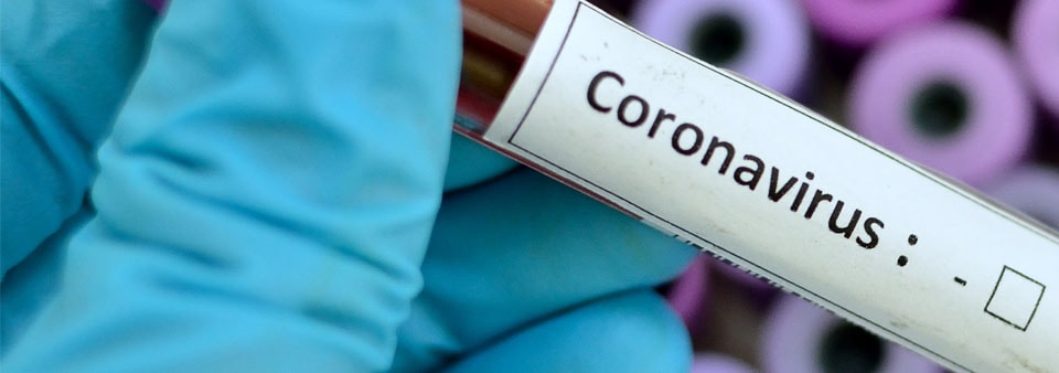 Пробирка с надписью коронавирус