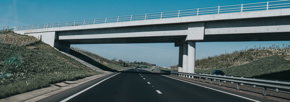 A central reservation barrier alongside a road, an example of a vehicle restraint system