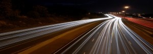 Image of street lighting, car lights blurred
