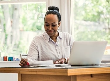 woman studying adaptive learning training