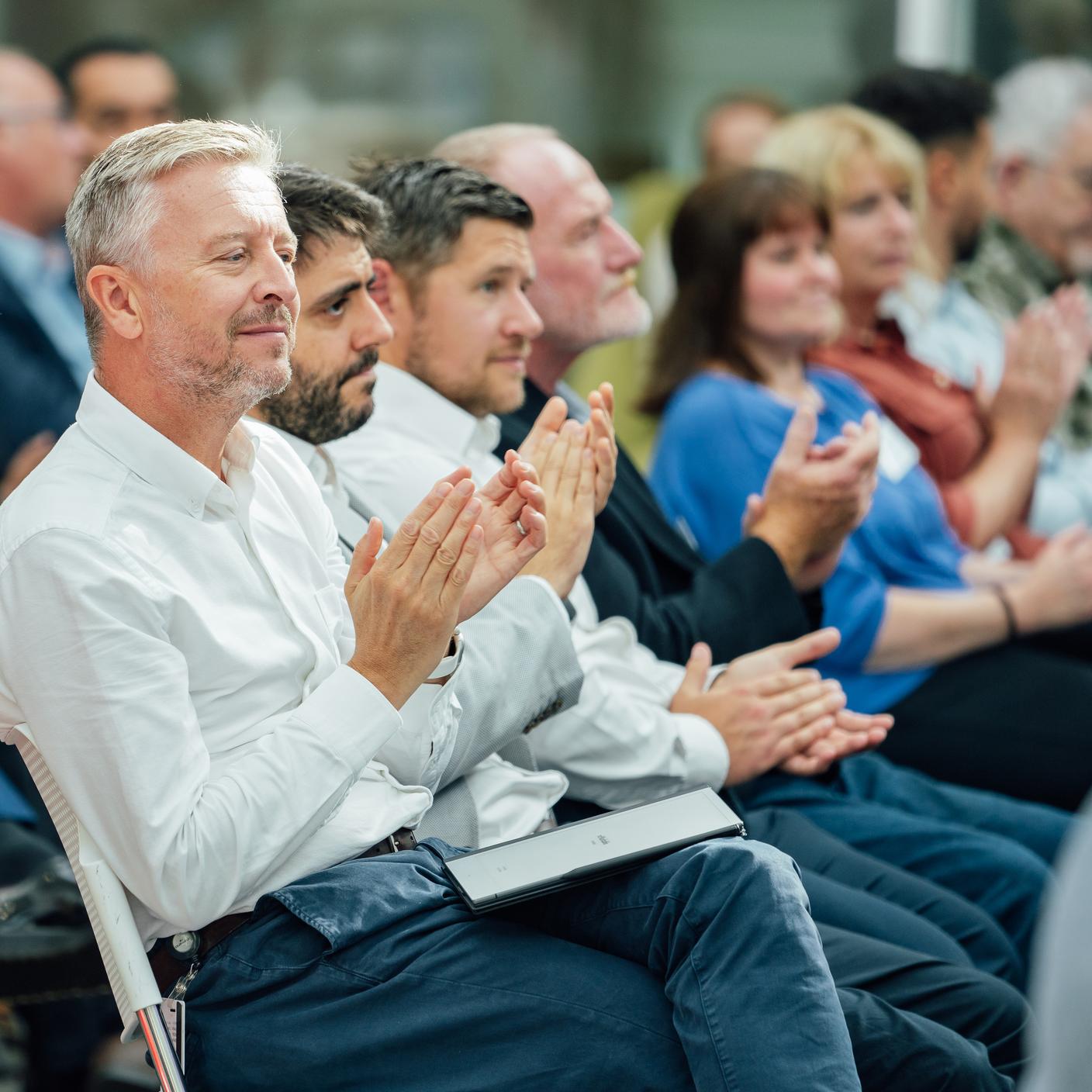 audience applauding at conference