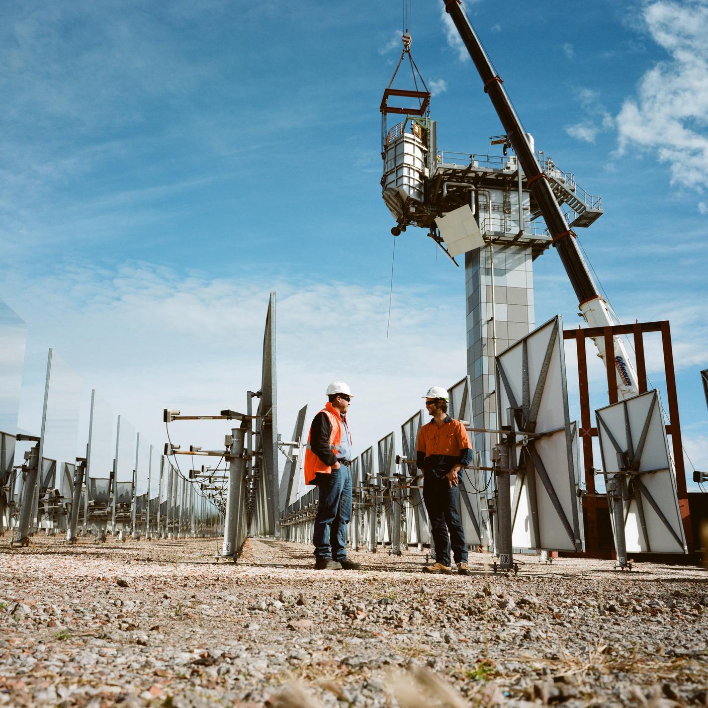 Innovation in Energy - Workmen at solar thermal research facility