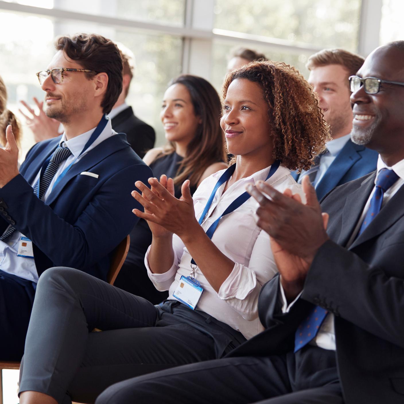 Fees for Conformity Assessment Activities IVDR (EUR) - audience applauding at a business seminar