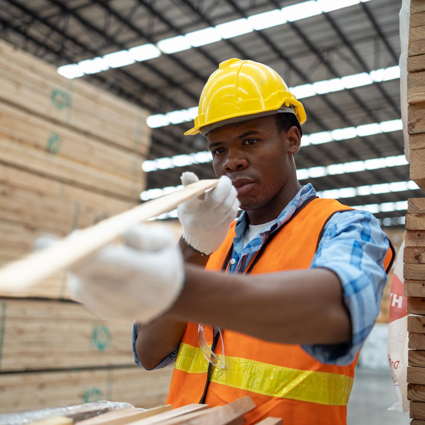 Standards that strengthen international trade - Worker in a safety vest and helmet