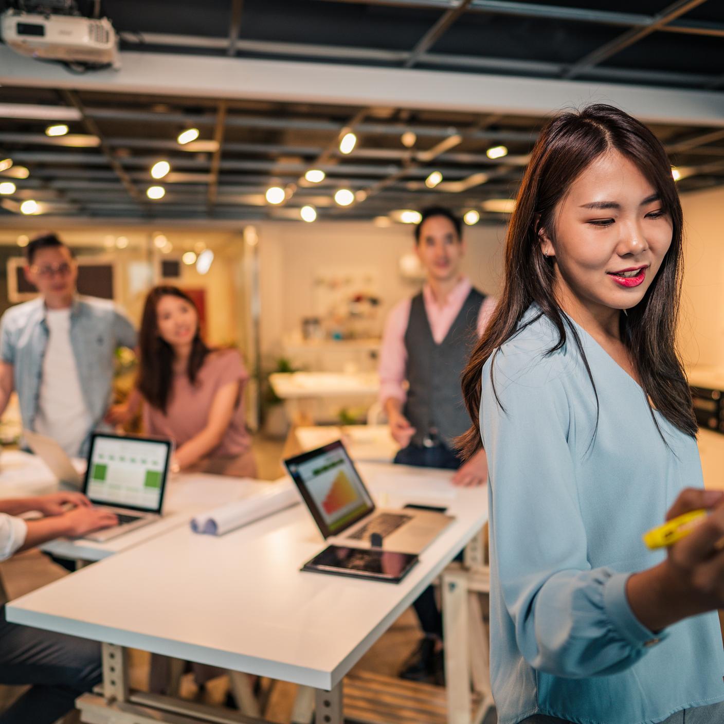 Young group of workers in digital office