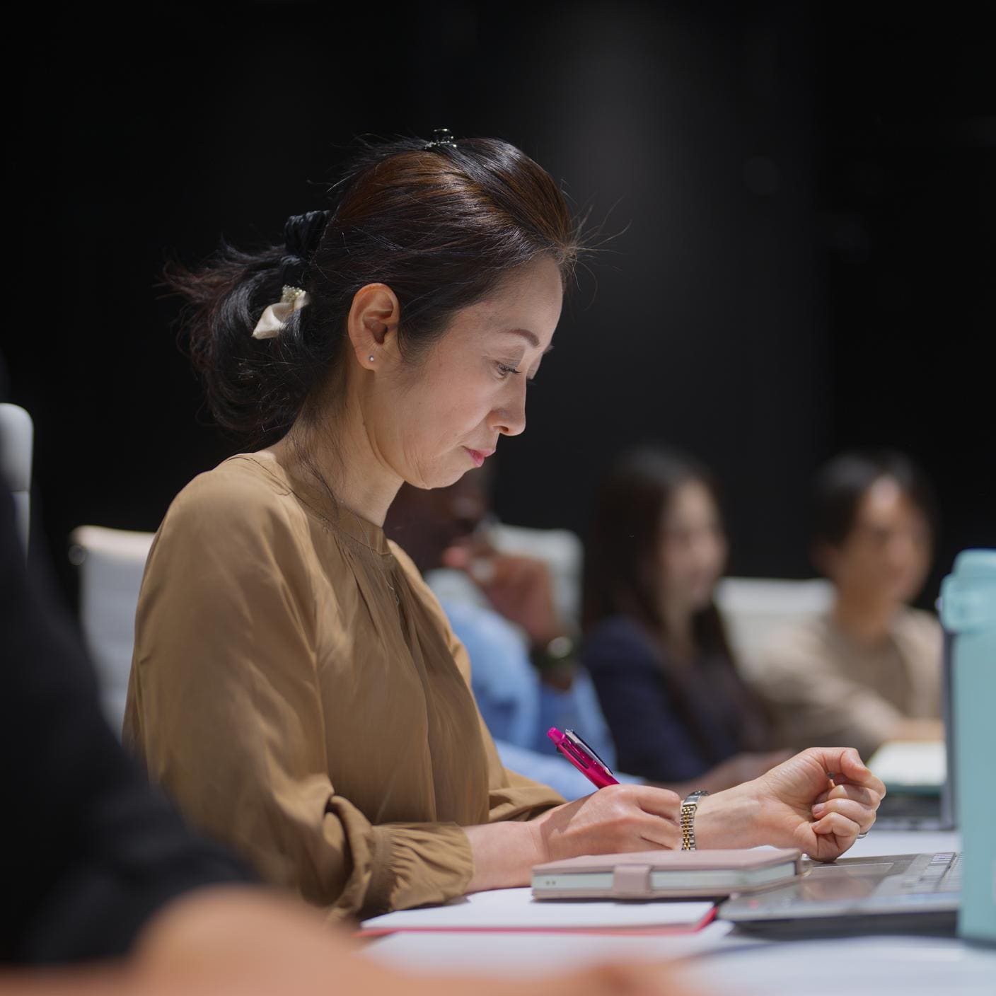 Business people are working and having business meeting together in the board room in an office.