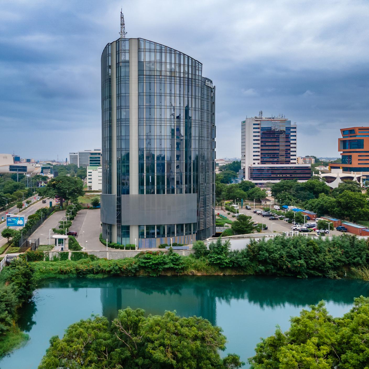 Bank head office building with surrounding streets and greenery