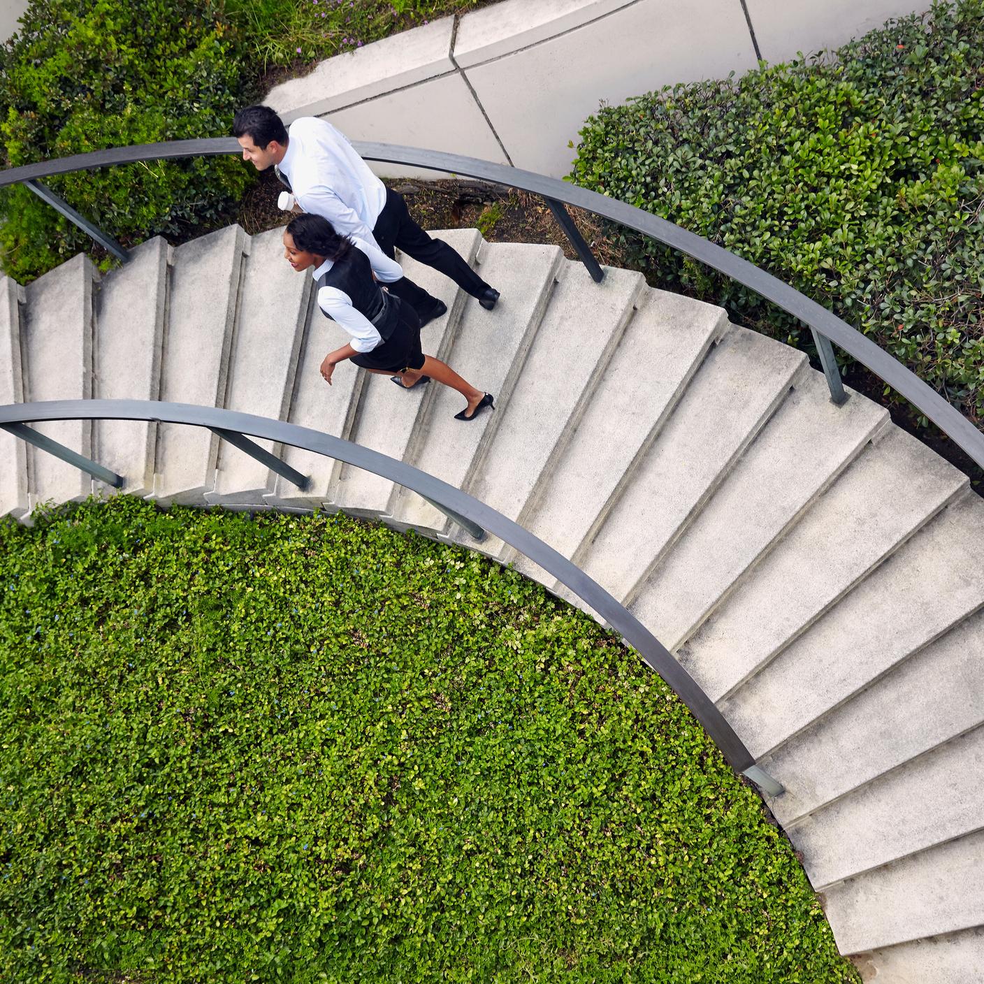 People walking on spiral stairs