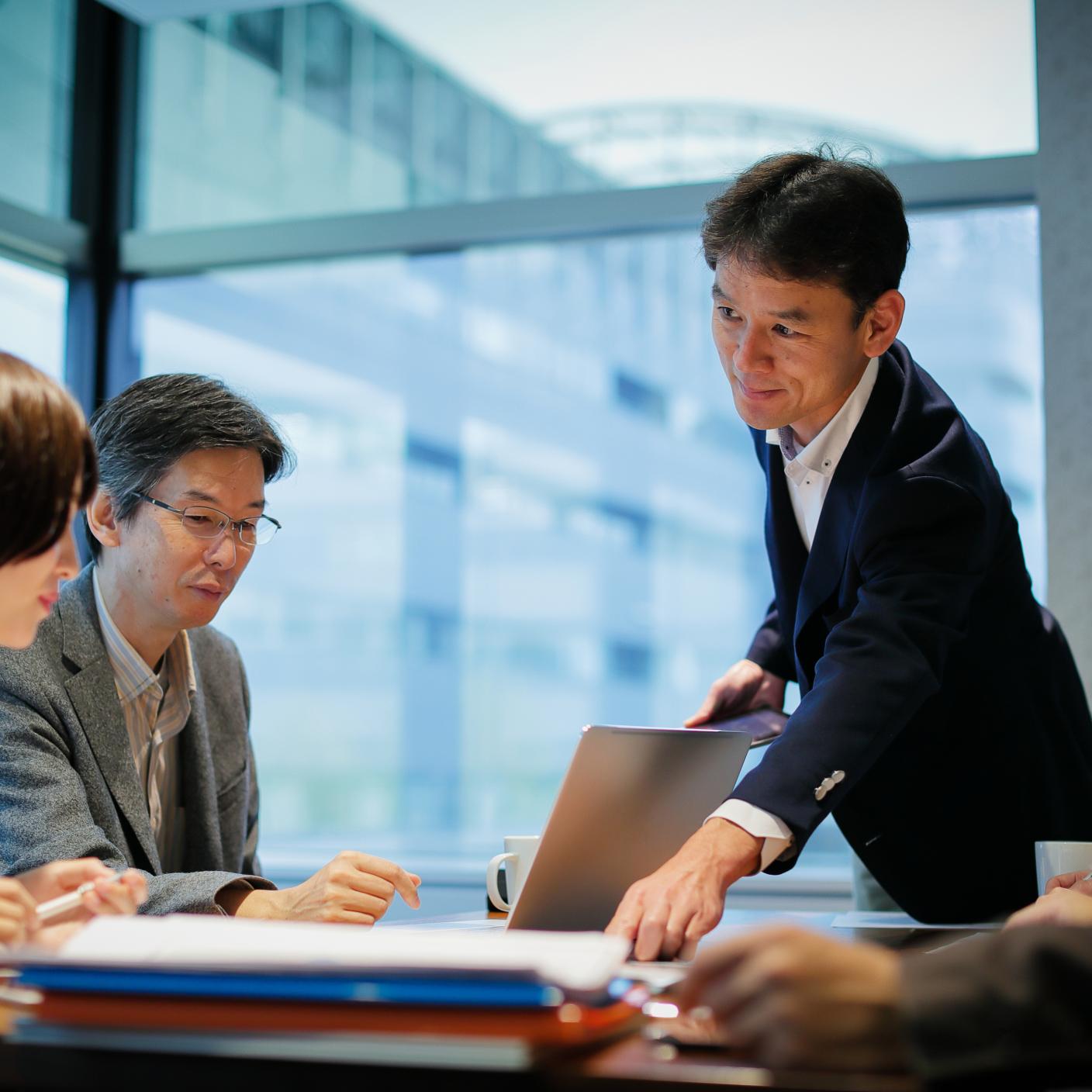 Businessman at a table having a meeting.
