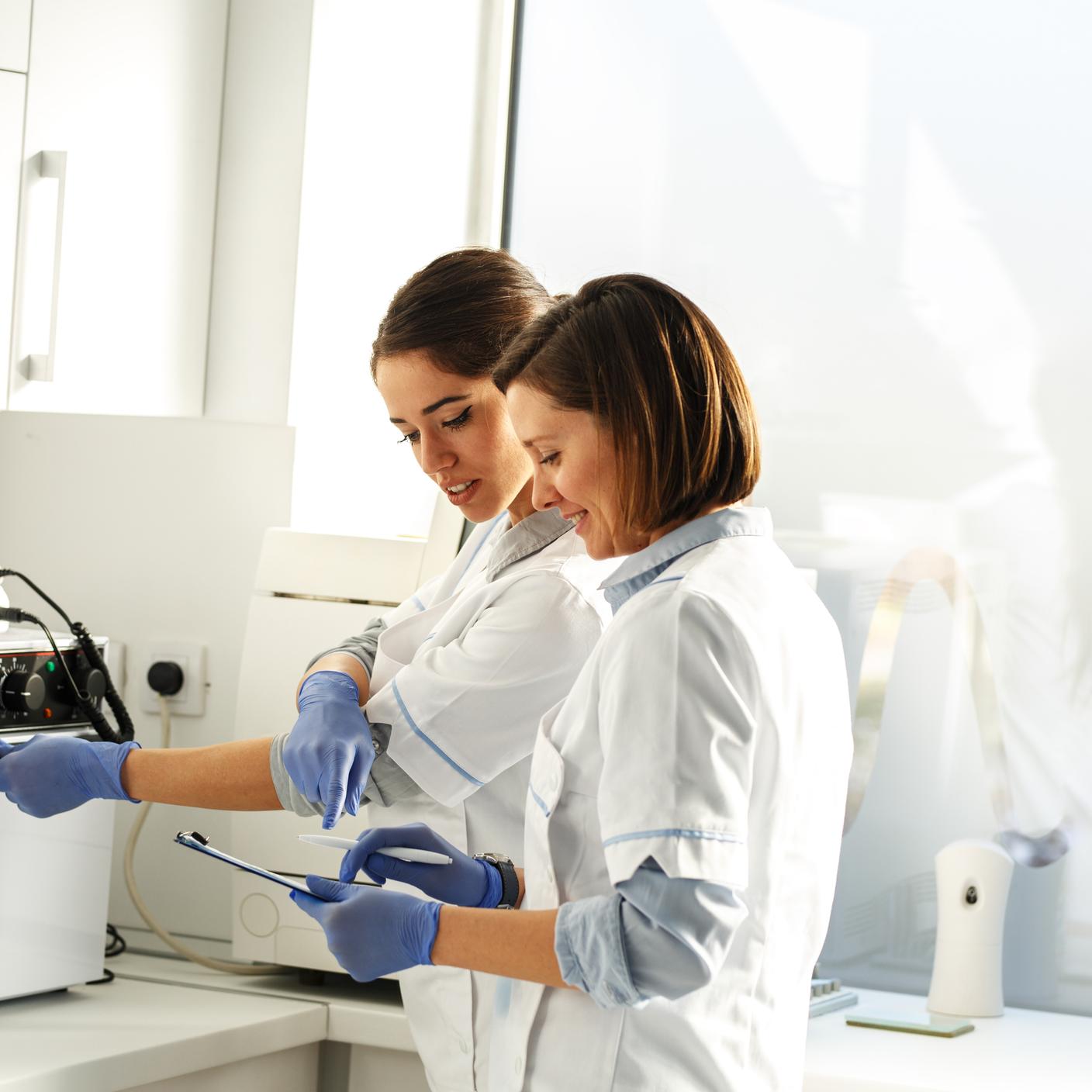 Two women consulting their data