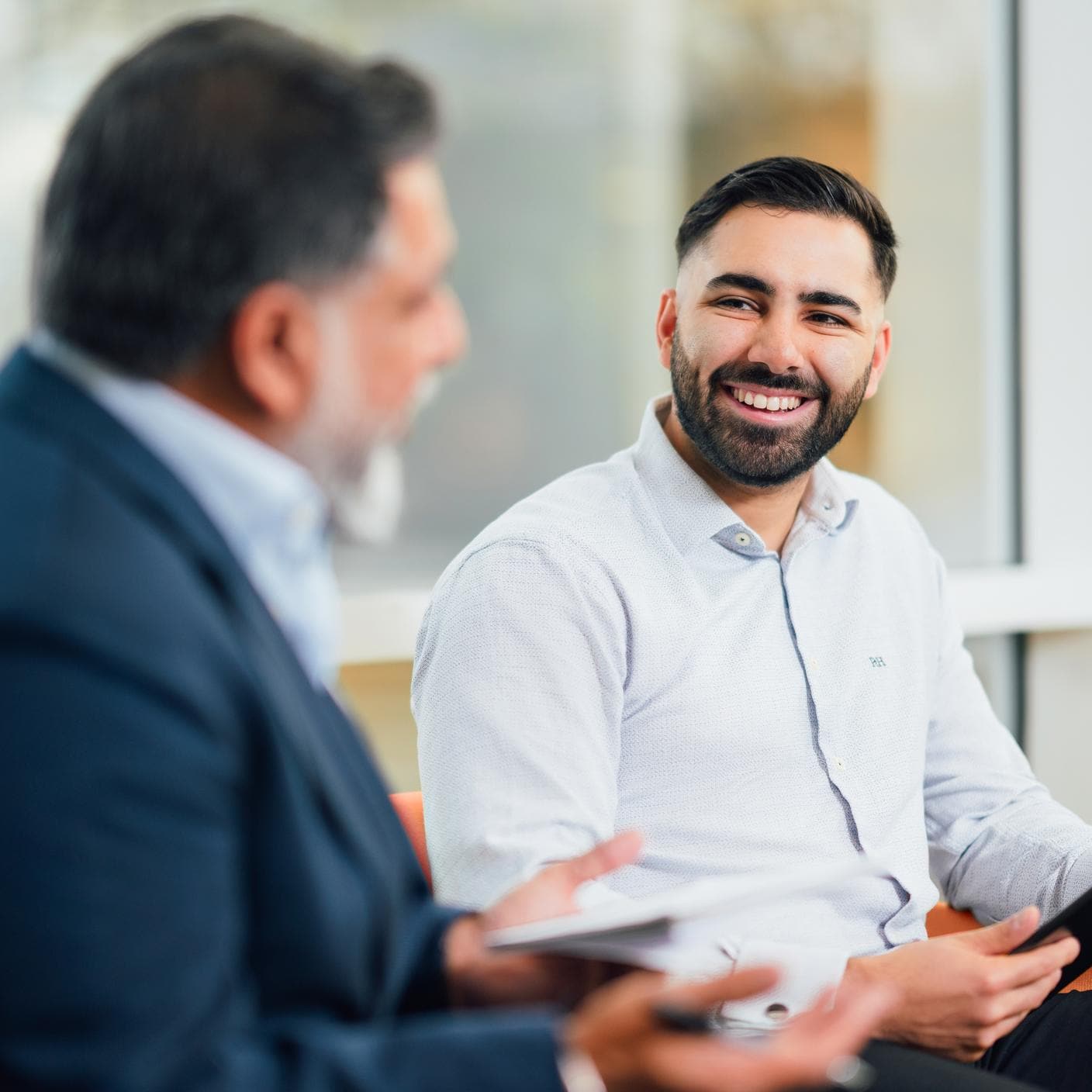 Two people in a business meeting