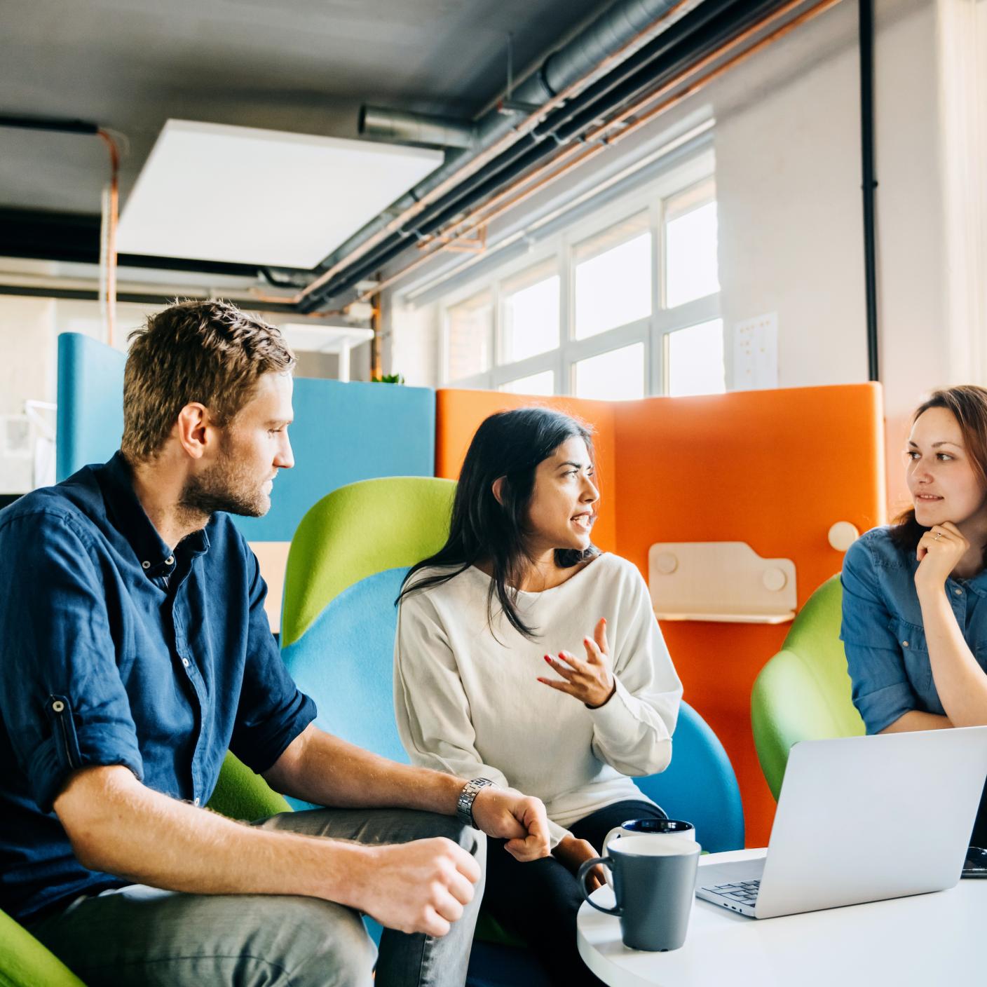 Office employees talking