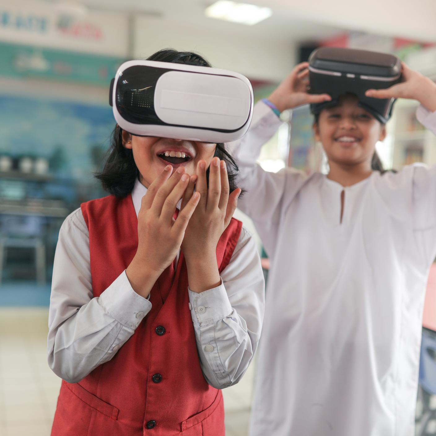 Kids wearing virtual reality masks