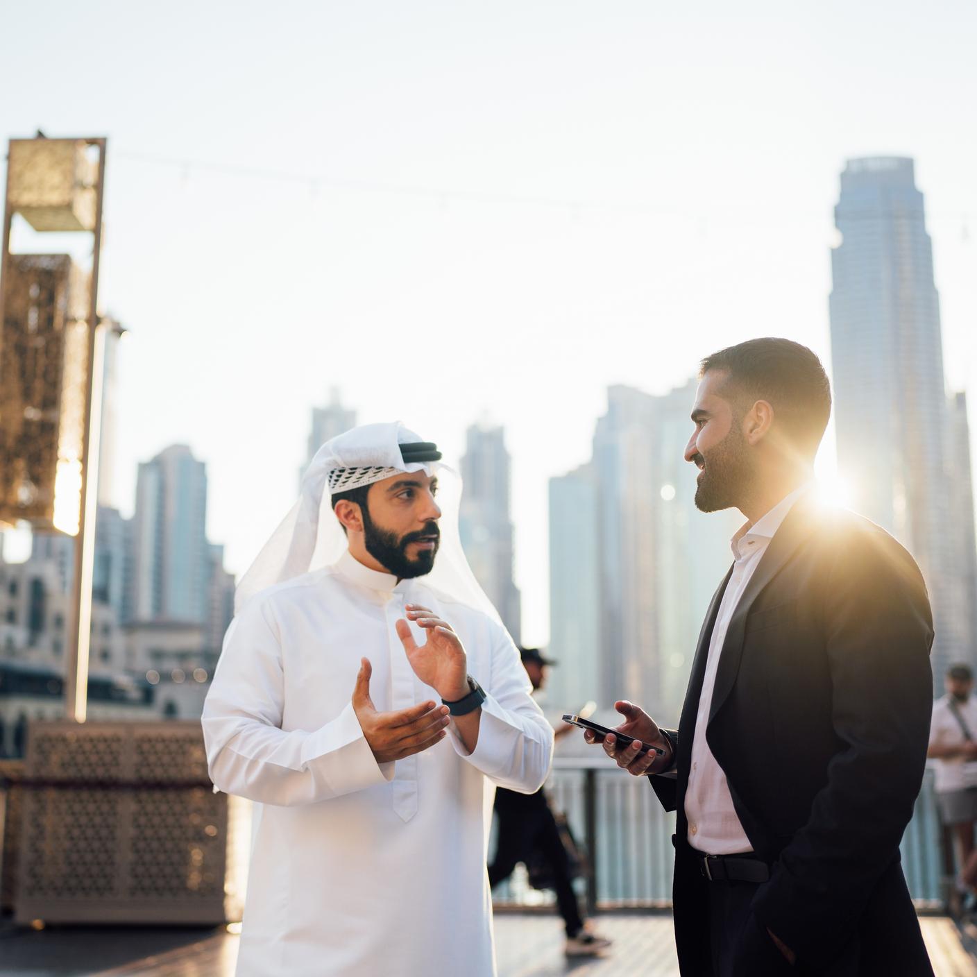 Two business men discussing in Dubai