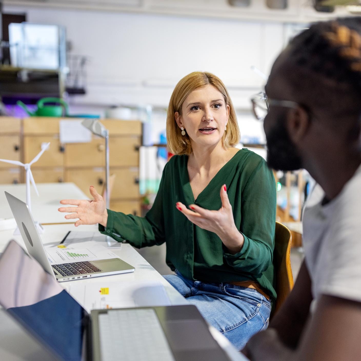 woman explaining wind turbine