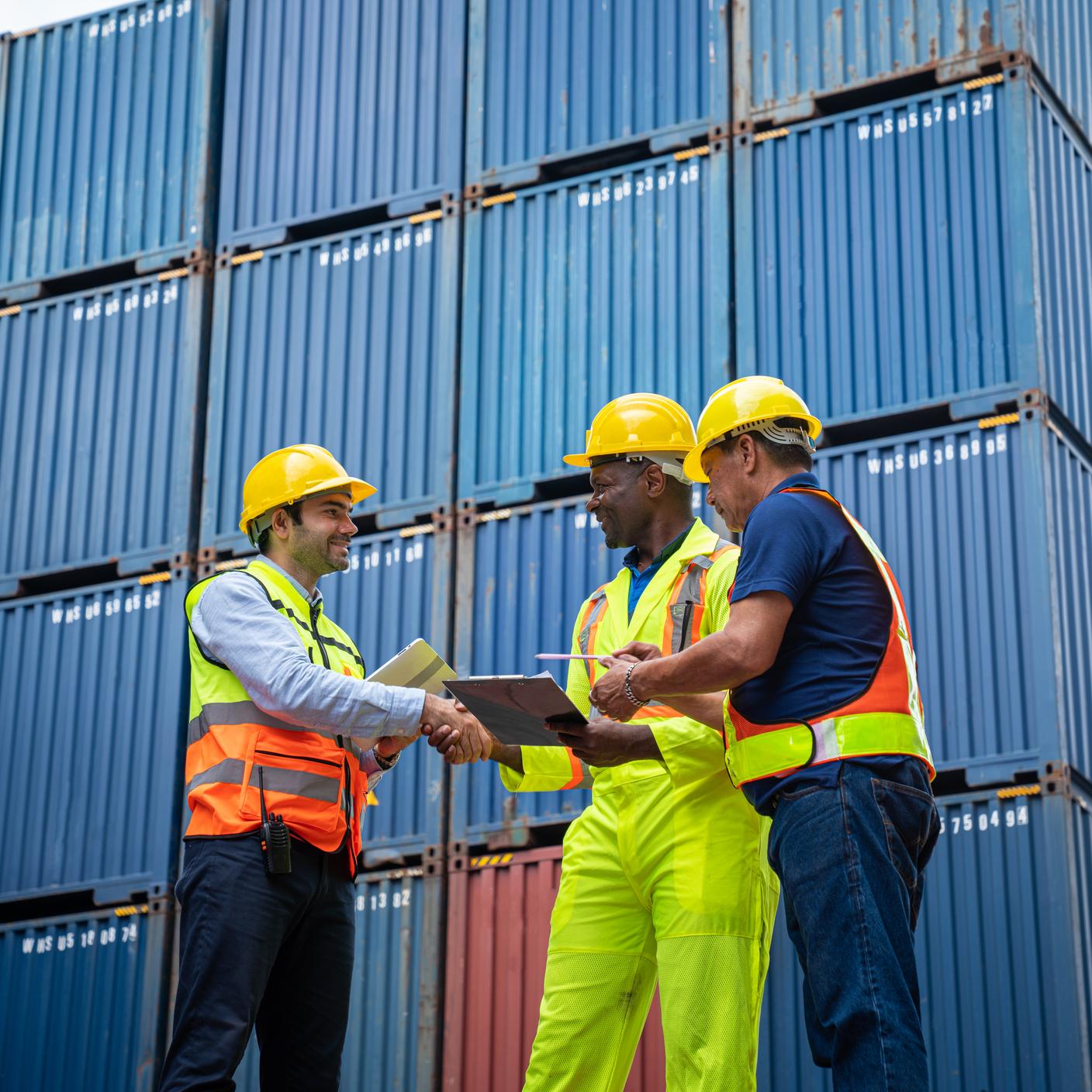 Engineer and foreman control checking containers at container yard