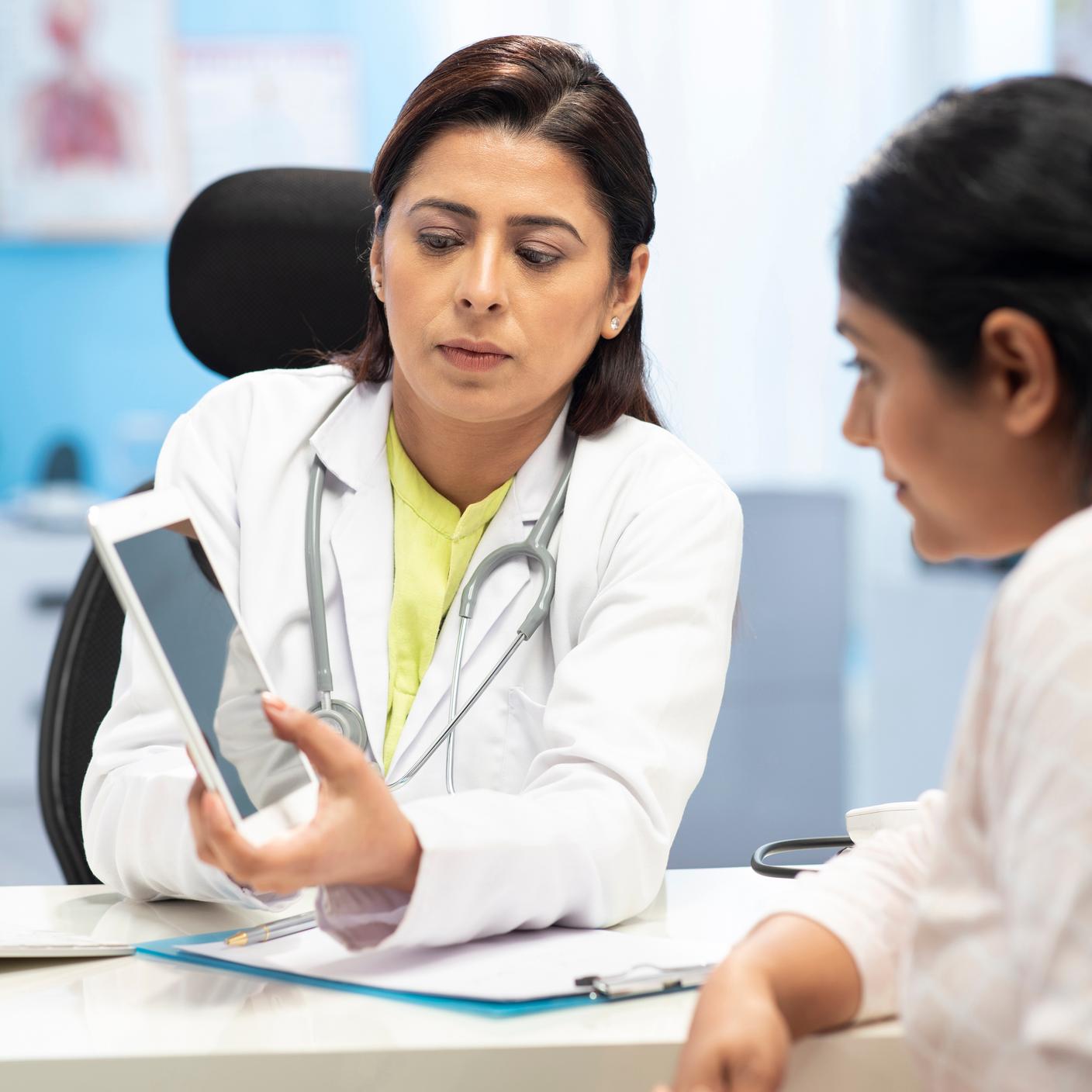 Indian, Doctor, Young woman, doctor clinic, Female Doctor, talking.