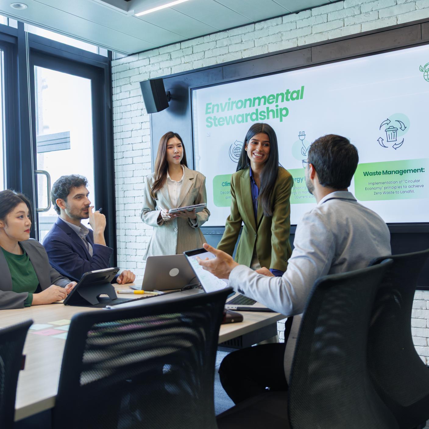 Indian Female Manager Presenting Sustainability Strategy to Team in Corporate Meeting. Indian Businesswoman Managing ESG Collaboration Session in Professional Office.