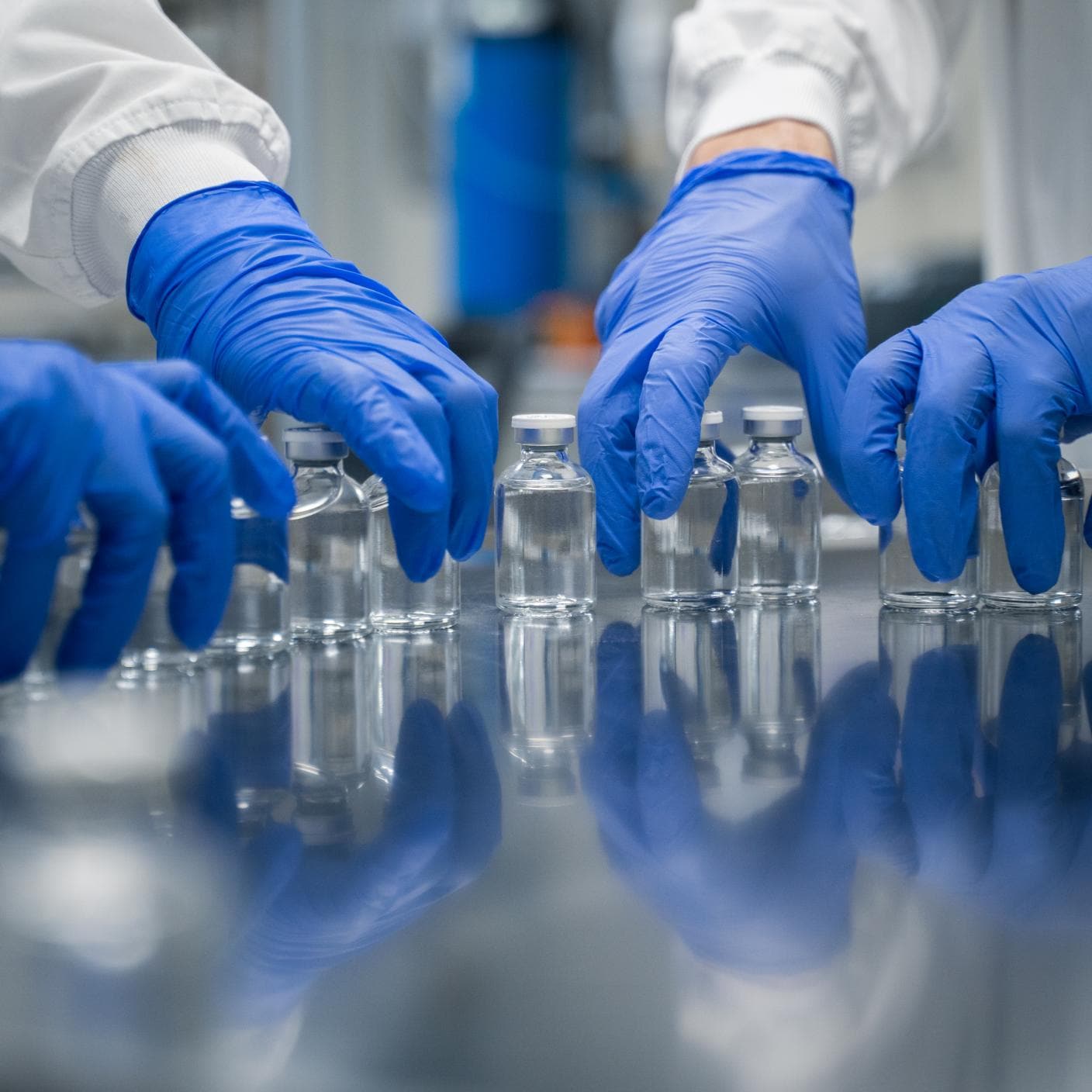 Interior view of pharmaceutical manufacturing and person working to keep production moving