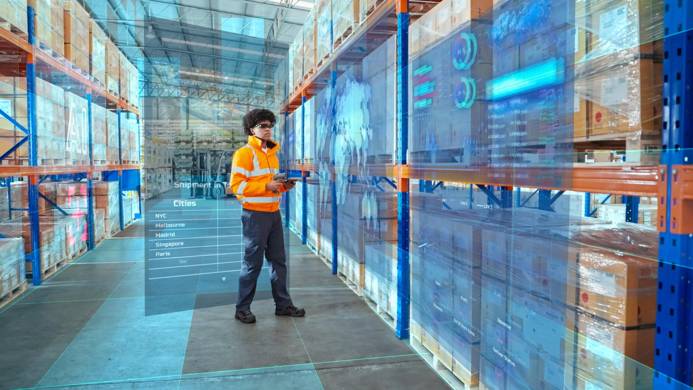 employee uses AI and Augmented Reality (AR) technology to analyze the logistics system within the warehouse.