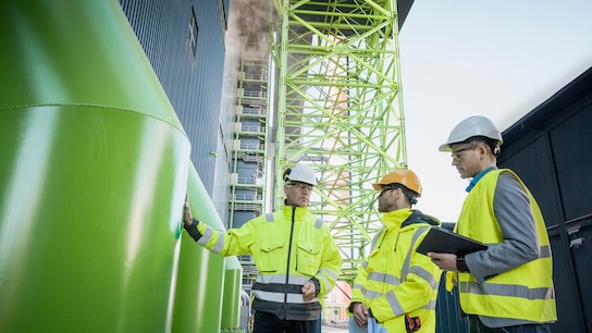 A team of engineers having a discussion at a building site