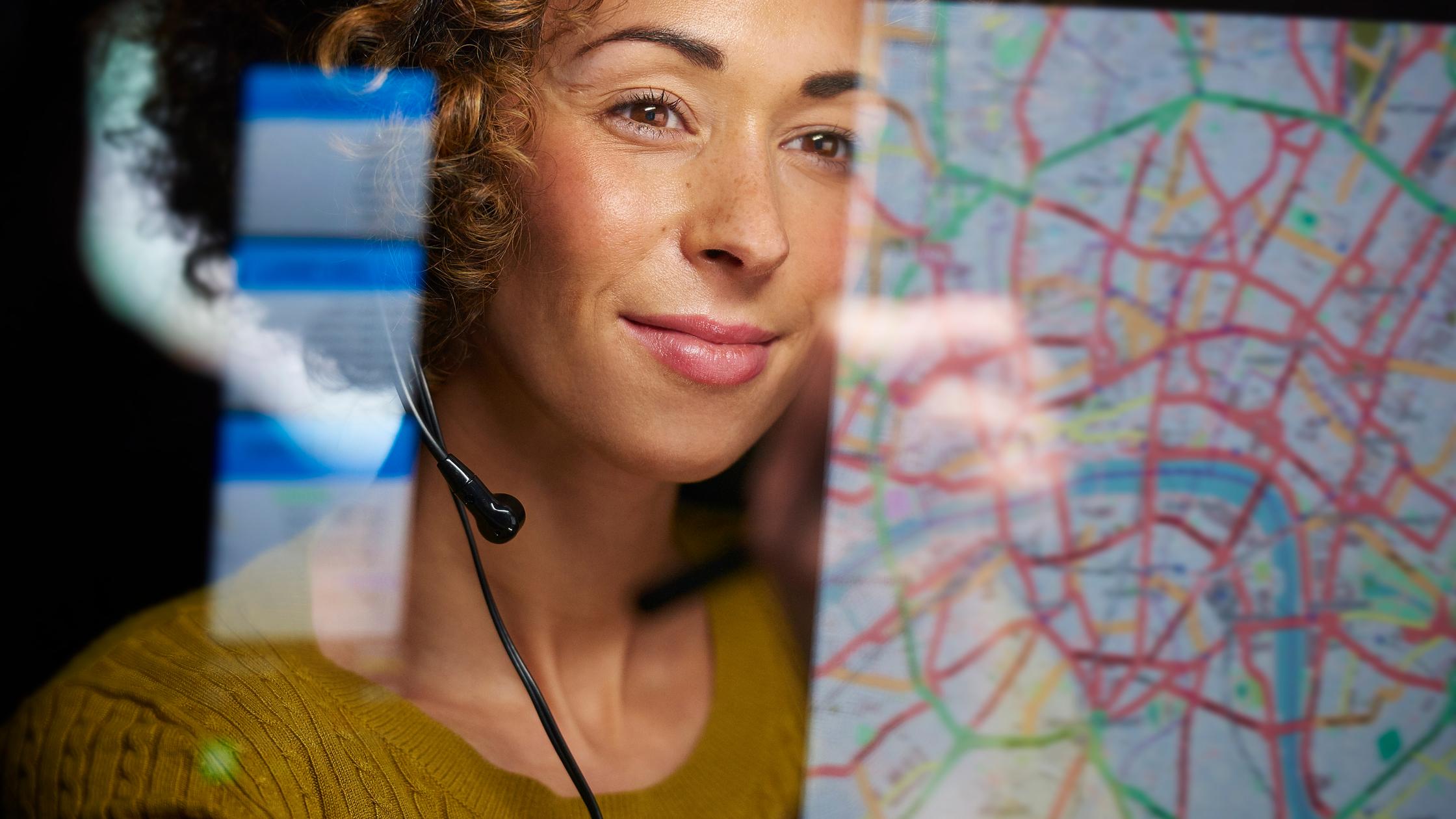 Digital trust woman watching map on screen