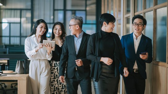 accelerating standards adoption in China - group of asian chinese successful office management team