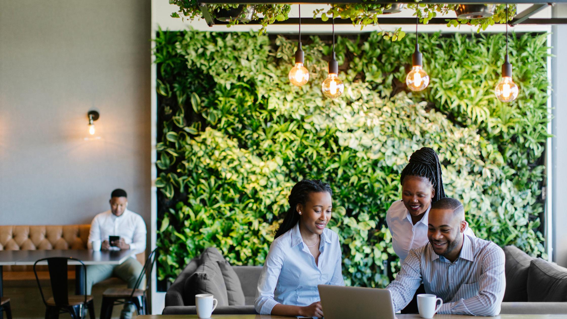 Young business people having a meeting in a beautiful office.
