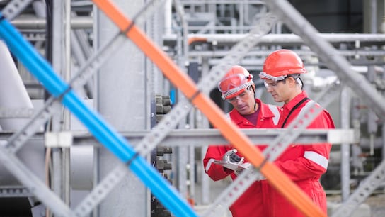 ISO 29001 - Oil and Gas Management System - Workers inspect gas storage plant, in Hampshire, England