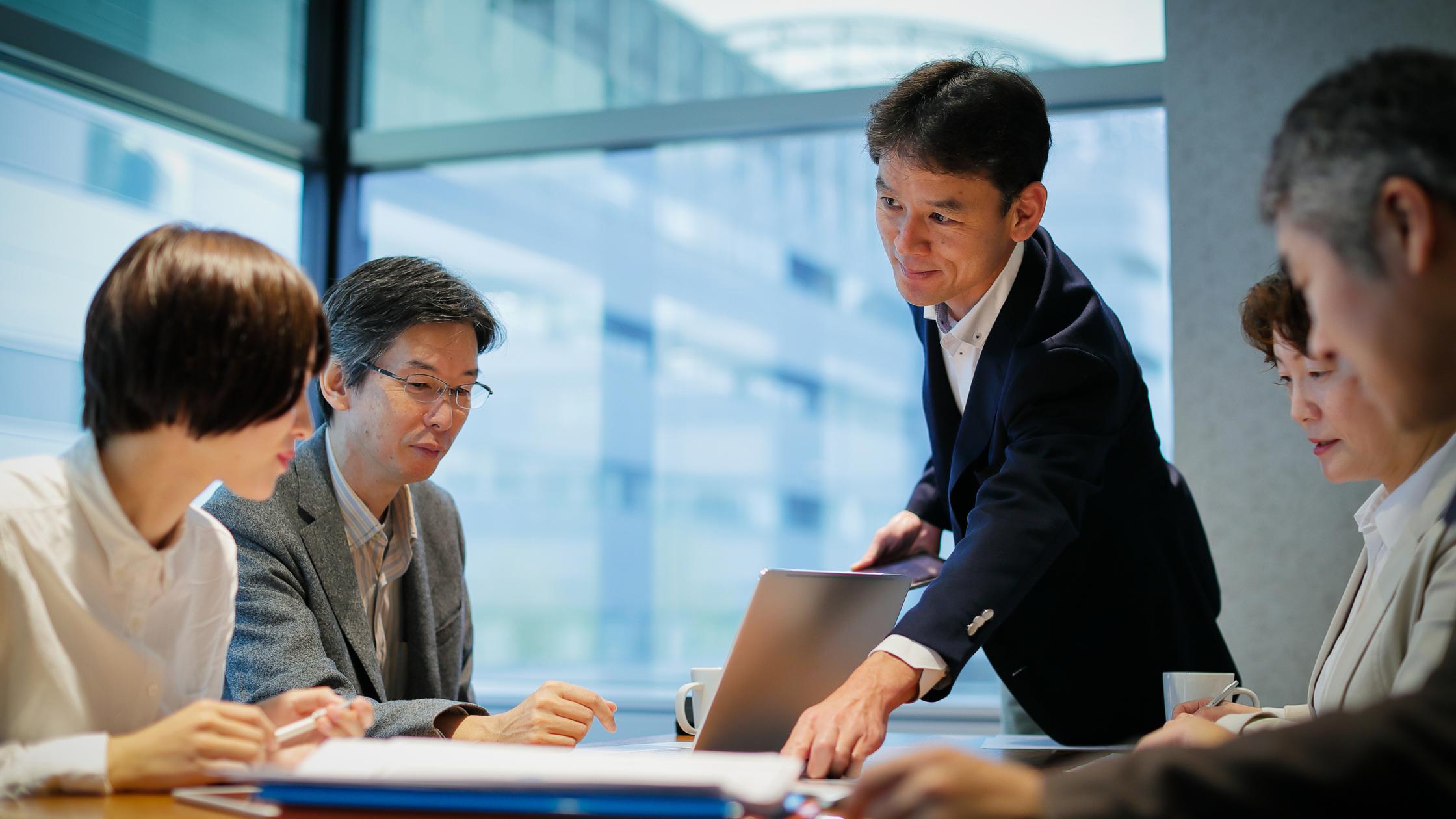 Businessman at a table having a meeting.