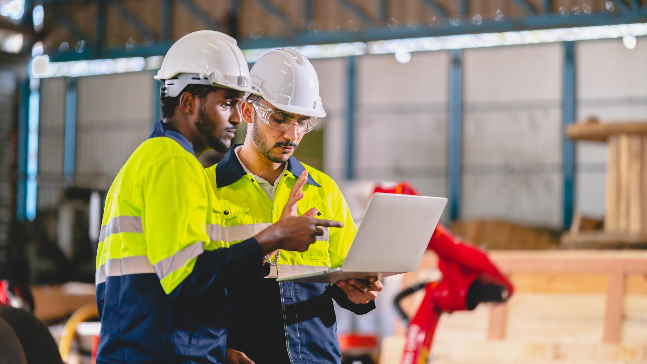 Technician people teamwork in work site wearing safety helmet hard hat