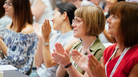 our people history - people applauding