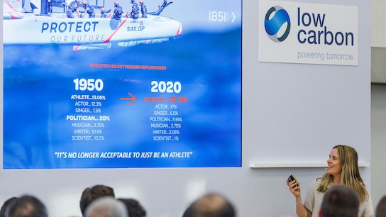 Hannah Mills, strategist of Great Britain SailGP Team, speaks at a Low Carbon conference alongside Roy Bedlow, CEO of Low Carbon.